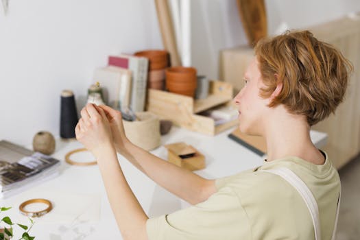 Person Holding a Sewing Needle